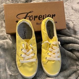 Yellow slip on shoes